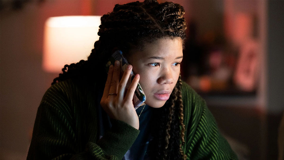 Storm Reid holds a phone to her head in Missing.