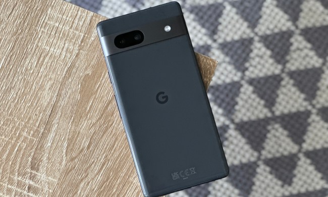 The Google Pixel 7a face down on a table.