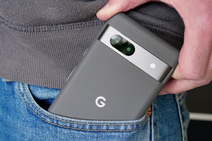 The Pixel 7a in a case and being taken out of a pocket.