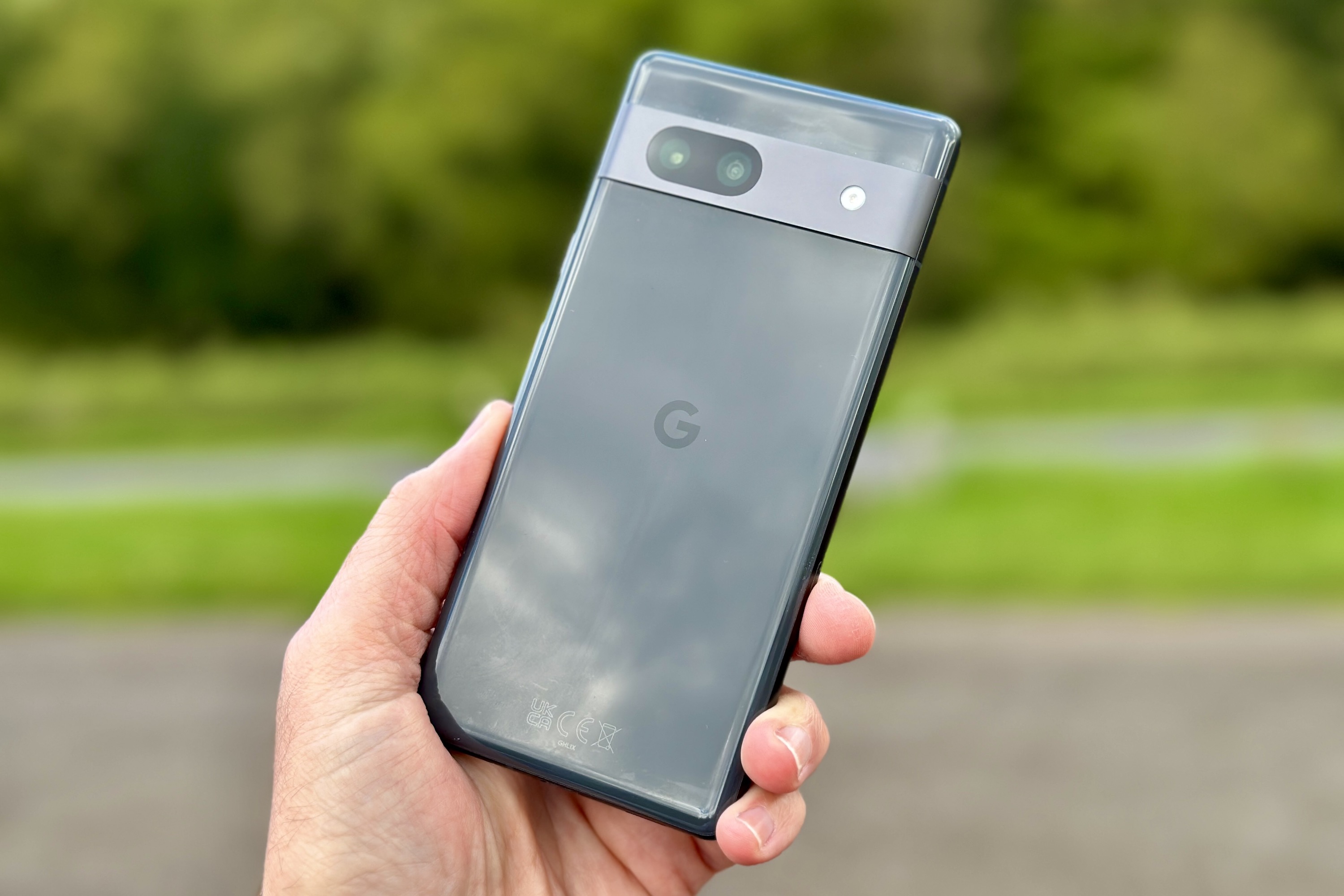 The Google Pixel 7a in a person's hand.
