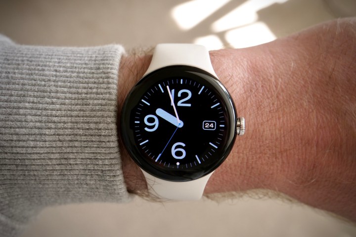 The Pixel Watch on a person's wrist.