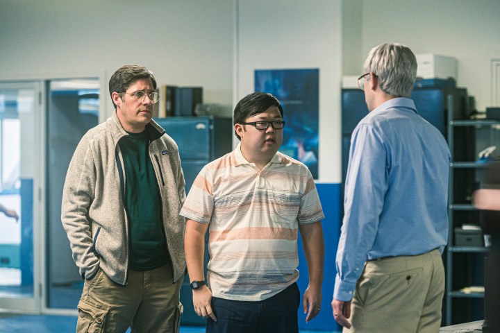 Rich Sommer and SungWon Cho look at Jay Baruchel in BlackBerry.