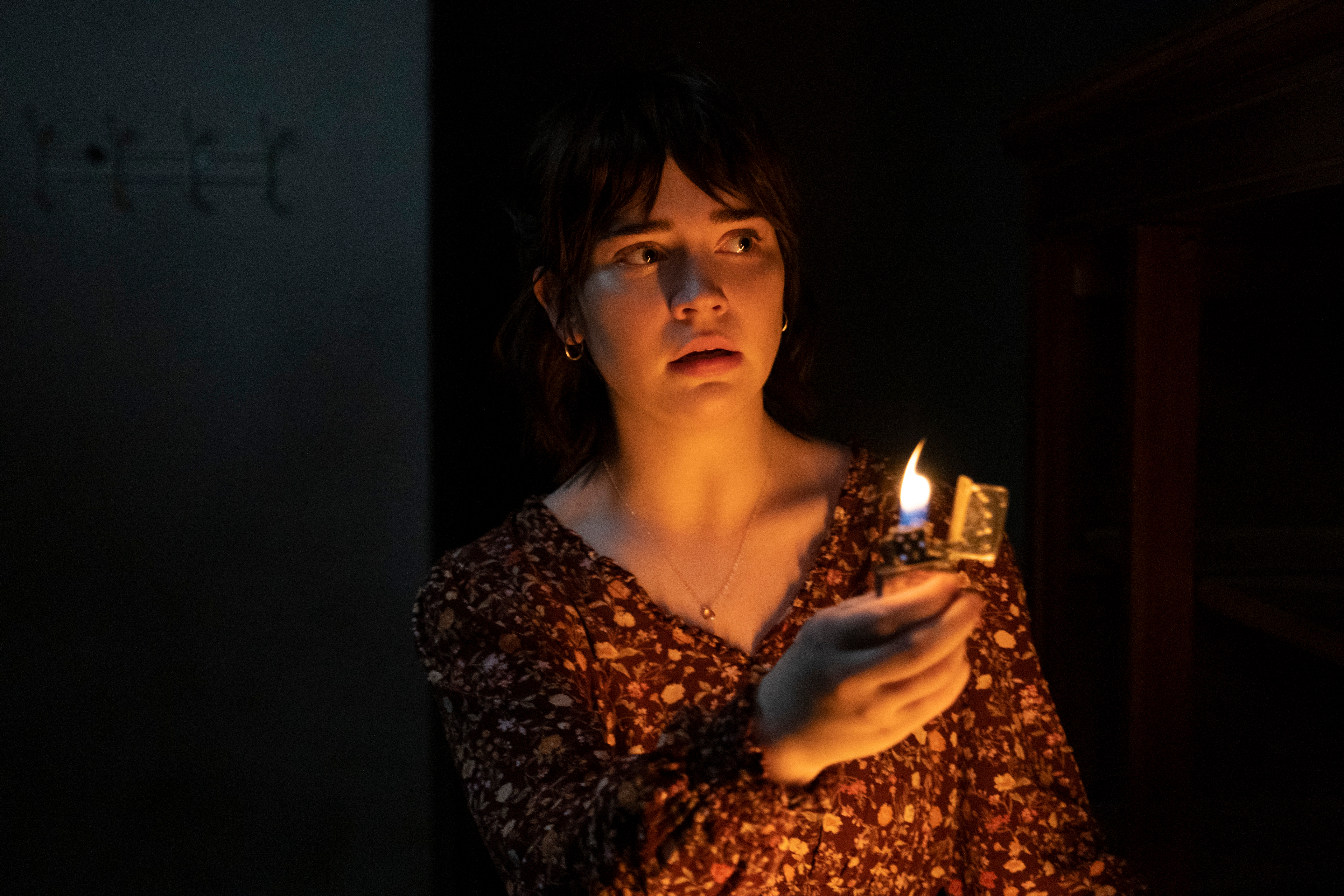 Sophie Thatcher holds a lighter in The Boogeyman.