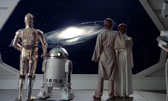 C-3PO, R2-D2, Luke, and Leia staring out at space in "Star Wars: The Empire Strikes Back."