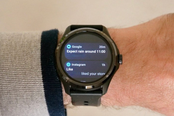 The Mobvoi TicWatch Pro 5 on a person's wrist, showing notificaitons.