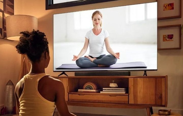 The VIZIO 65" Class M6 Series 4K QLED HDR Smart TV M65Q6-J09 being used as a meditation coach.