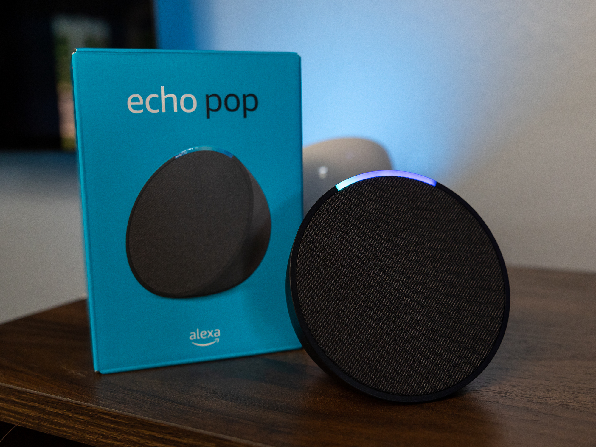 The Amazon Echo Pop and its retail box.