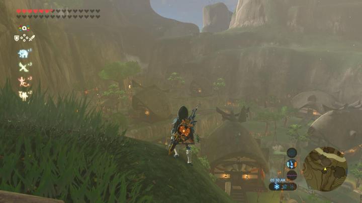 Link looks down at Kakariko Village in The Legend of Zelda: Breath of the Wild.