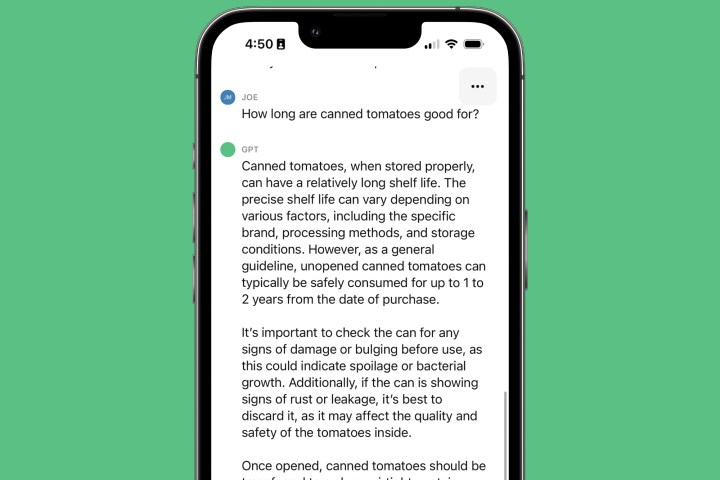 The ChatGPT iPhone app answering the question "how long are canned tomatoes good for."