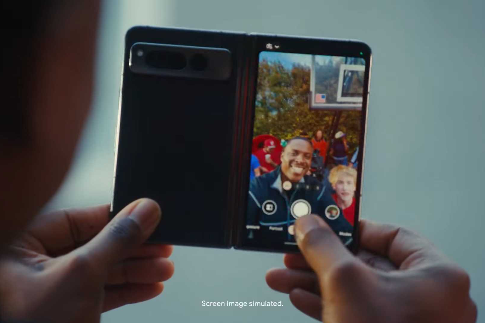 Someone taking a selfie with the Google Pixel Fold.