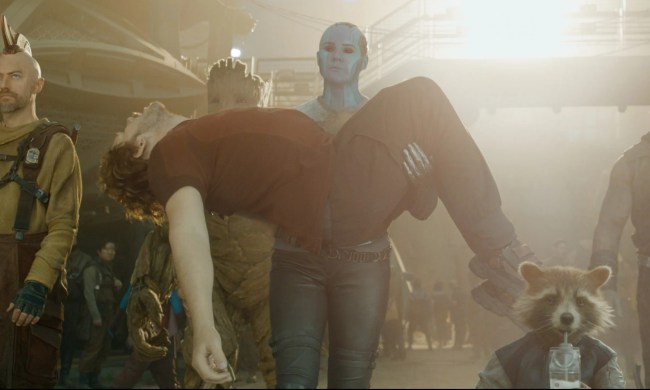 Nebula carries Star-Lord's limp body in Guardians of the Galaxy Vol. 3.