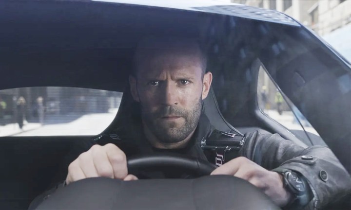 Jason Statham drives a car in The Fast & Furious 6.