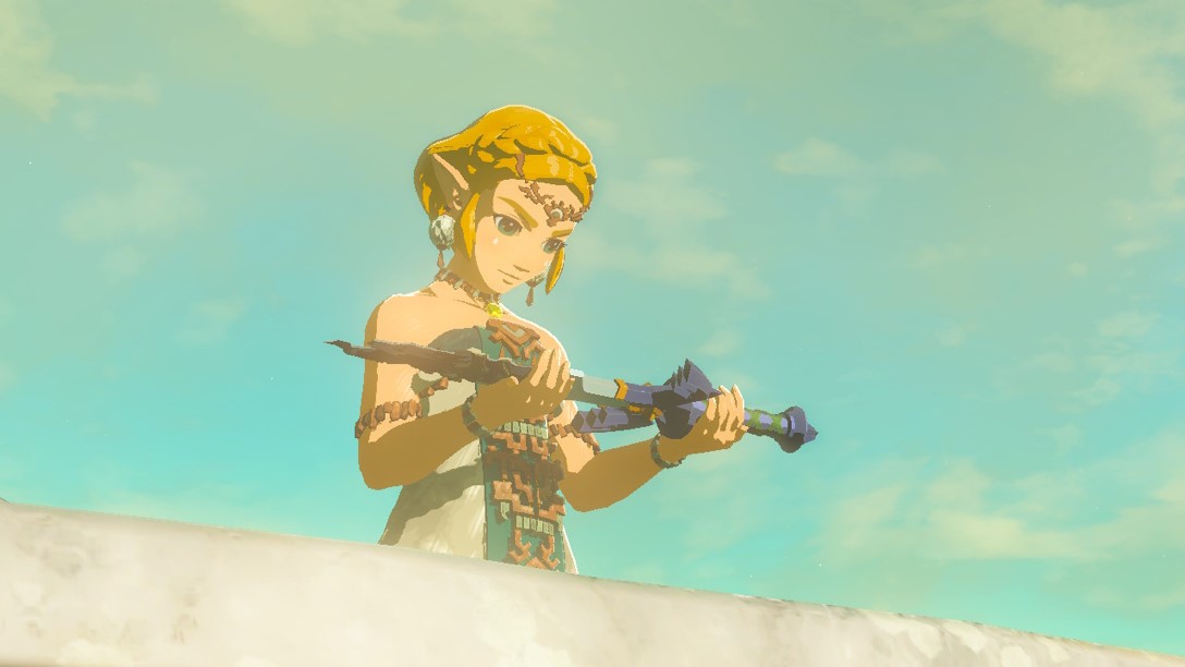 Zelda segurando a decadente Master Sword em Tears of the Kingdom.