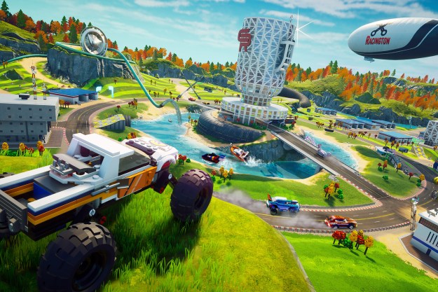 Lego cars drive around a green open world in Lego 2K Drive.