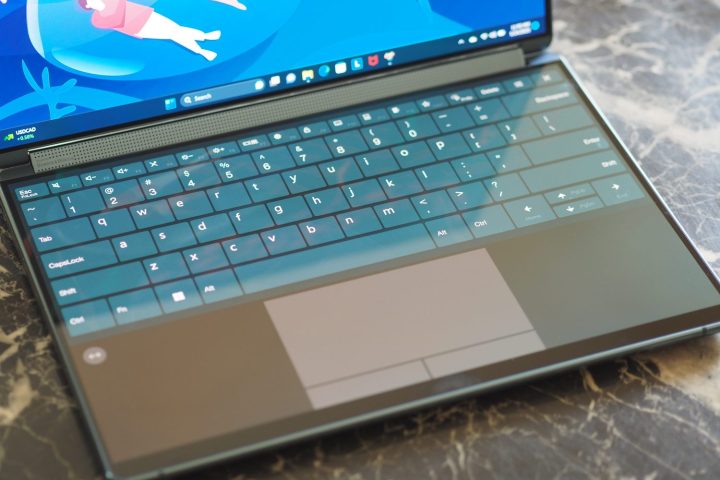 Lenovo Yoga Book 9i top down view showing virtual keyboard and touchpad.