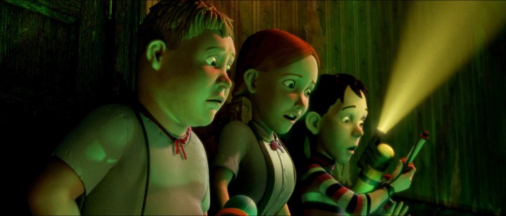 Three kids look scared in Monster House.