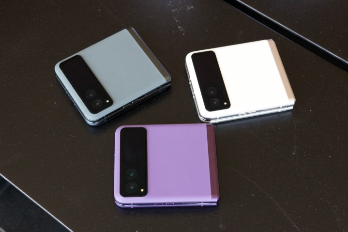 The Motorola Razr (2023) in all three colors lying on a table.