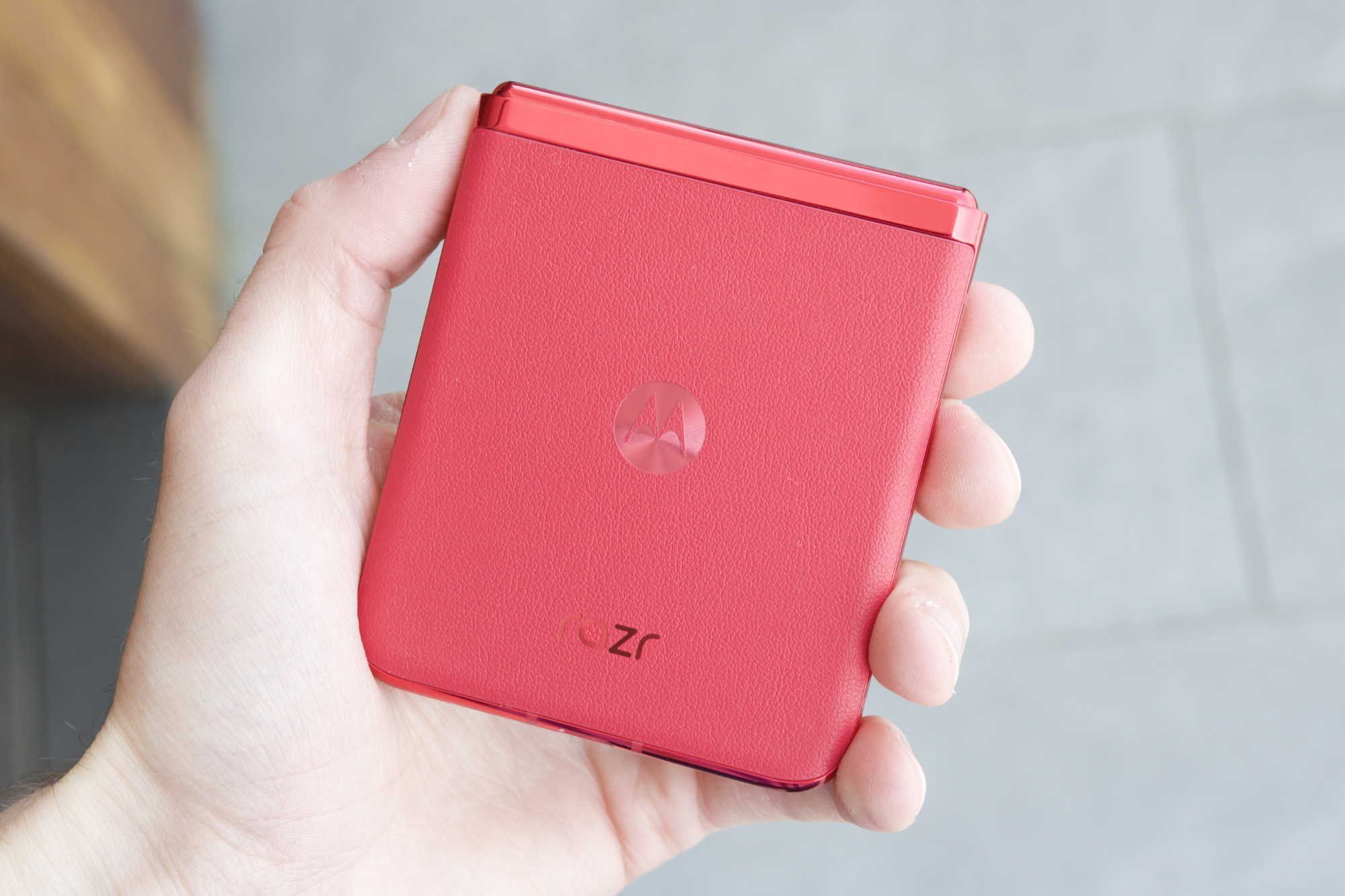 The back of the red Motorola Razr Plus.