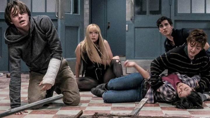 Teens lie on the floor in New Mutants.