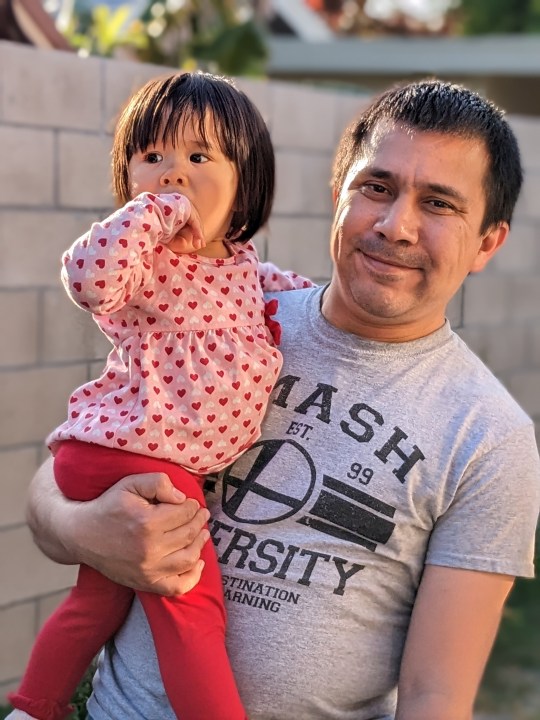 Portrait of dad and daughter taken with Google Pixel 6a