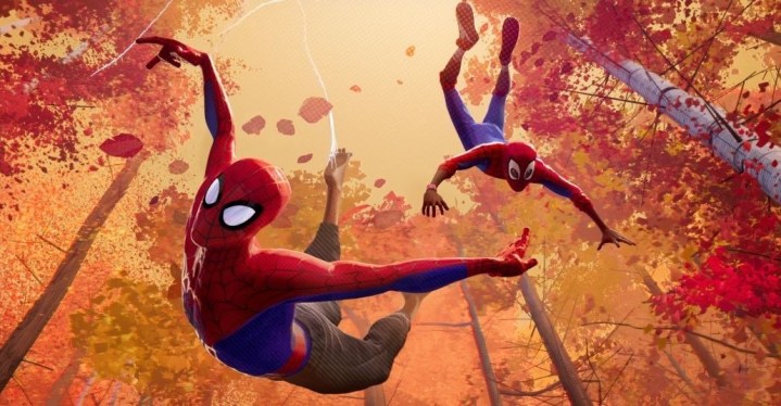 Two Spider-Men swing through trees in Spider-Man: Into the Spider-Verse.
