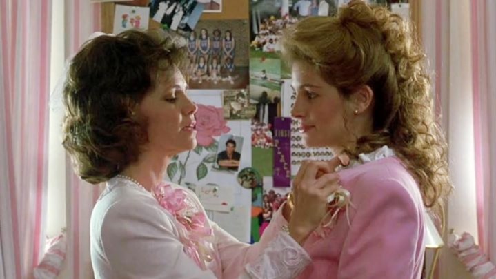A mother fixes her daughter's dress in Steel Magnolias.