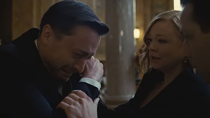 Roman breaks down crying as Shiv and Kendall try to console him in a scene from Succession.