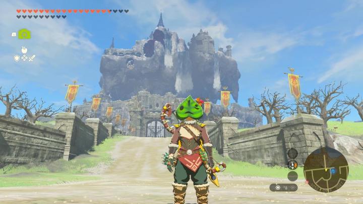 Link looks at Hyrule Castle in The Legend of Zelda: Tears of the Kingdom.