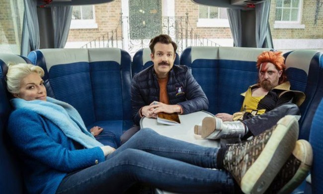 Three people hang out in a bus in Ted Lasso.