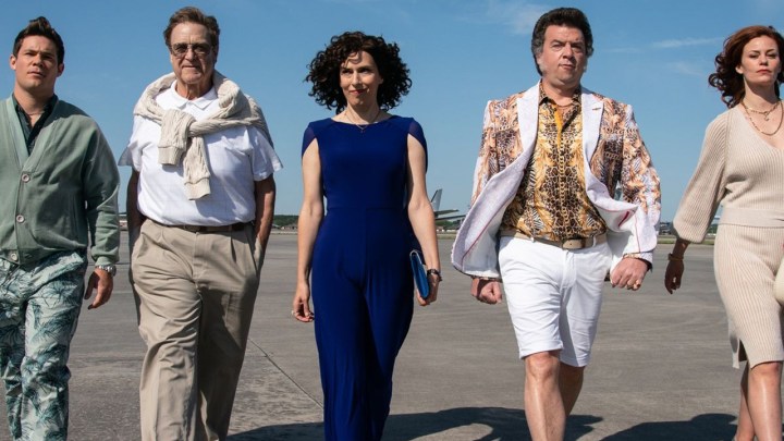 The family from The Righteous Gemstones walking outside side by side.