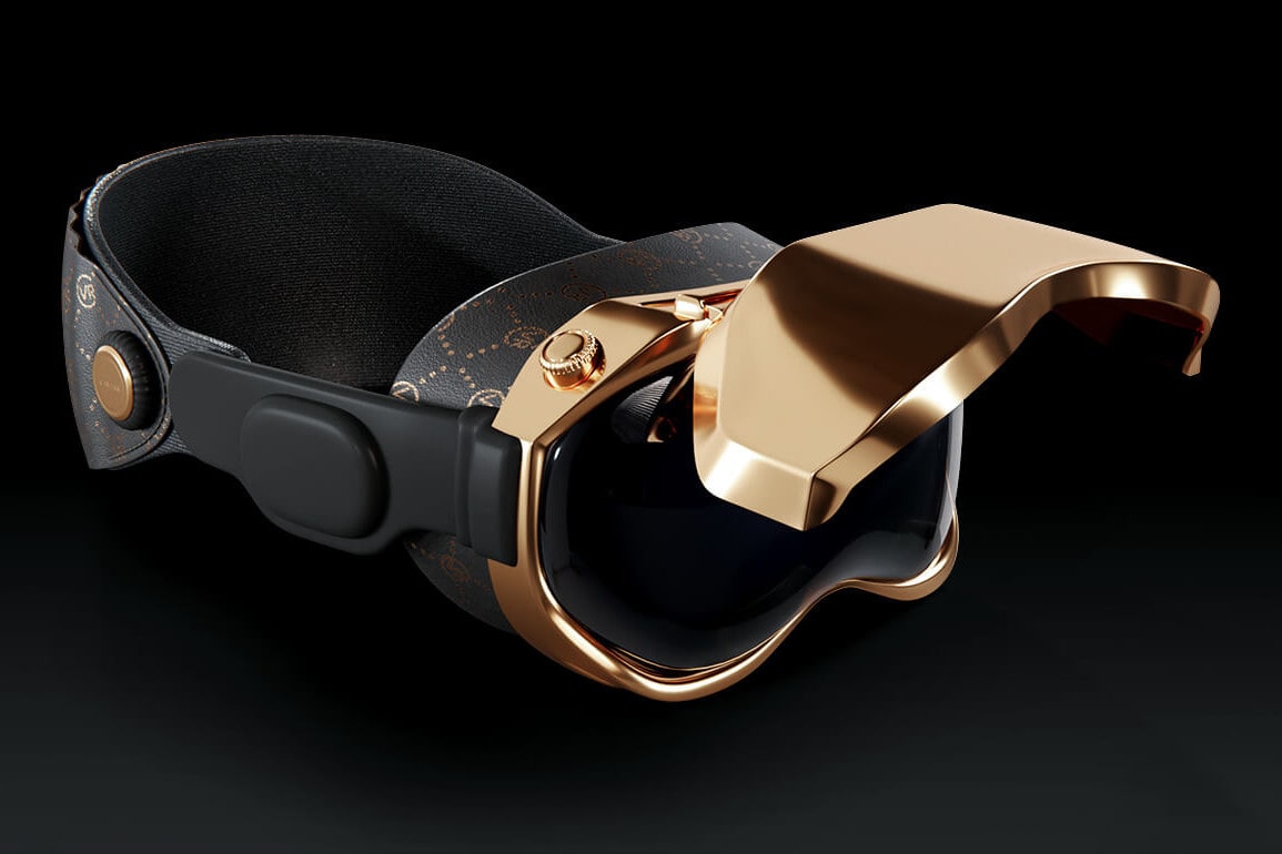 The Caviar 18-karat gold version of Apple's Vision Pro headset with its front plate flipped up, seen from the side.
