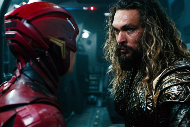 Aquaman looks at The Flash in Justice League.
