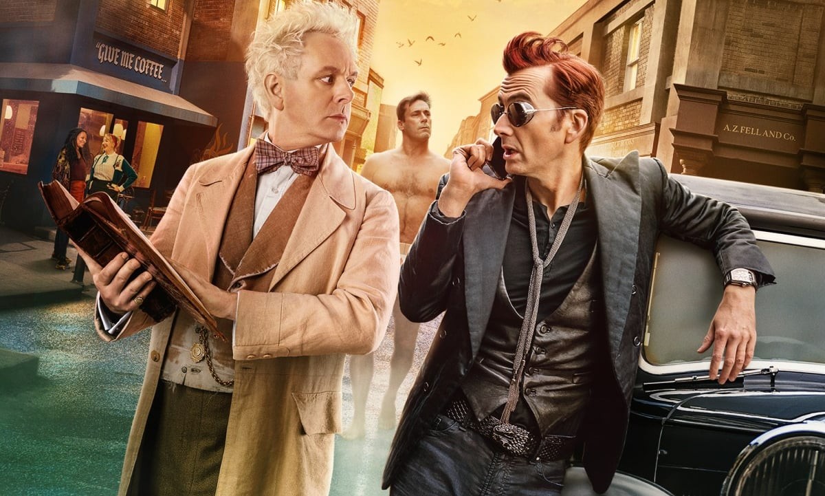 Two men look at each other in Good Omens season 2.