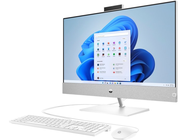 The HP Pavilion All-in-One 27 with a keyboard and mouse on a white background.