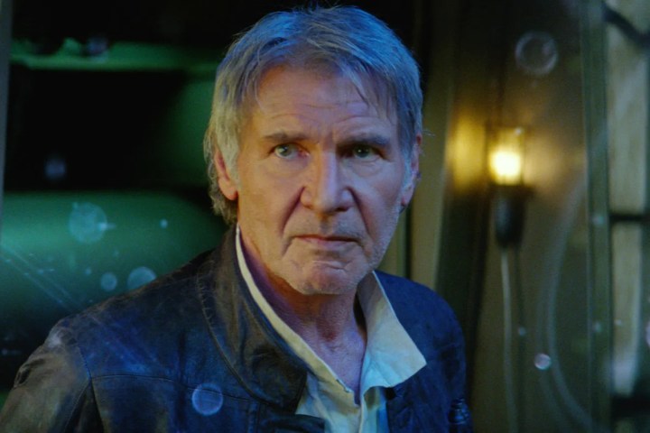 Han Solo stands in the Millennium Falcon in Star Wars: The Force Awakens.