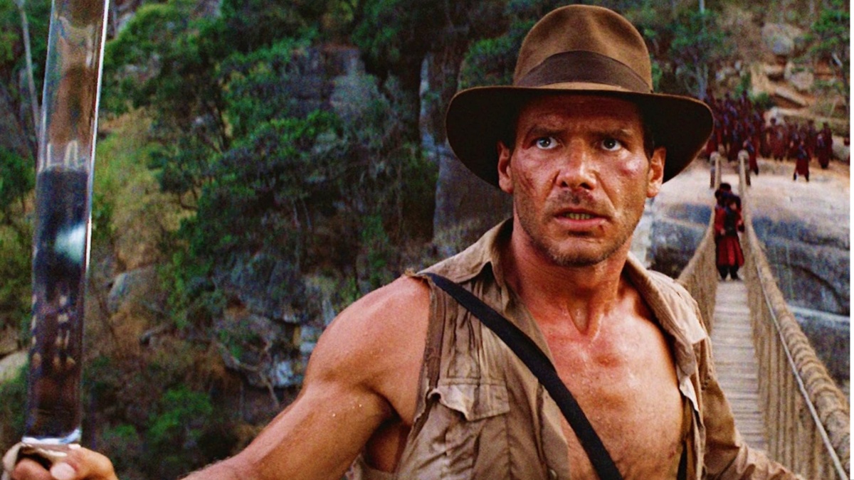 Harrison Ford holds a sword in Indiana Jones and the Temple of Doom.