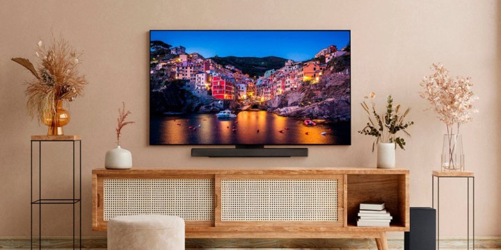 The LG C3 OLED TV placed in a living room on a TV unit.