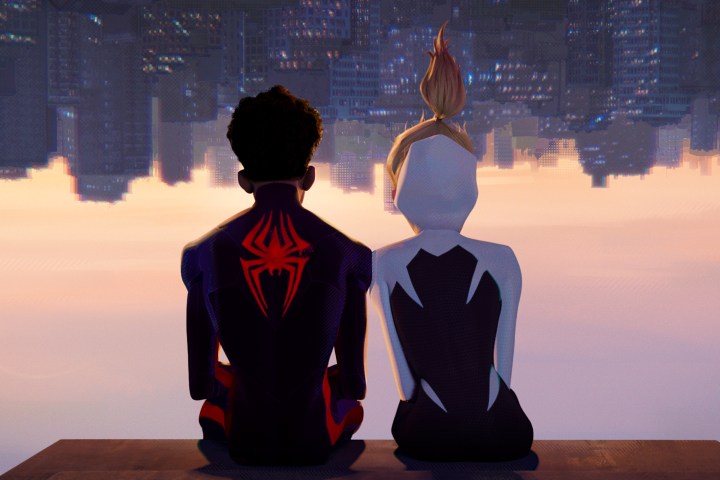 Miles Morales and Gwen Stacy hang upside down together in Spider-Man: Across the Spider-Verse.