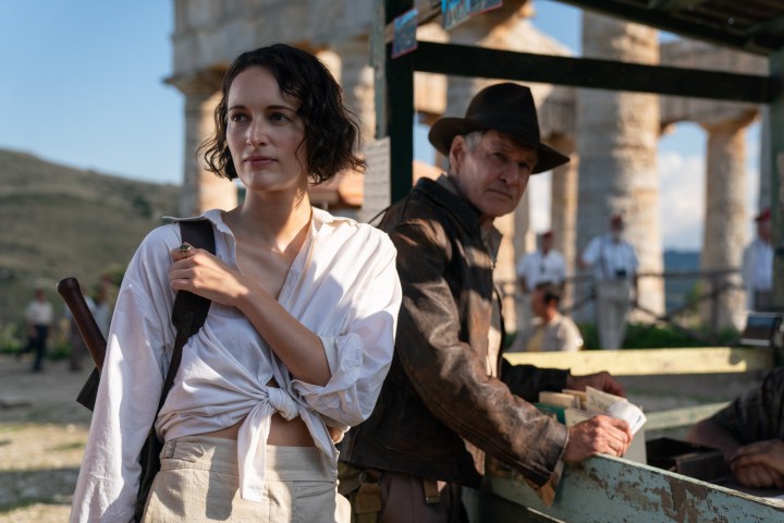 Phoebe Waller-Bridge stands by Harrison Ford in Indiana Jones and the Dial of Destiny.