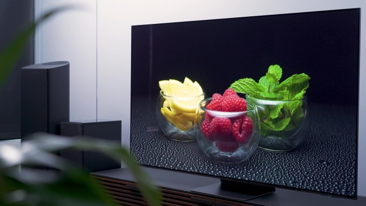 An image of bowls with lemon, raspberries, and mint displayed on a Samsung S95C.