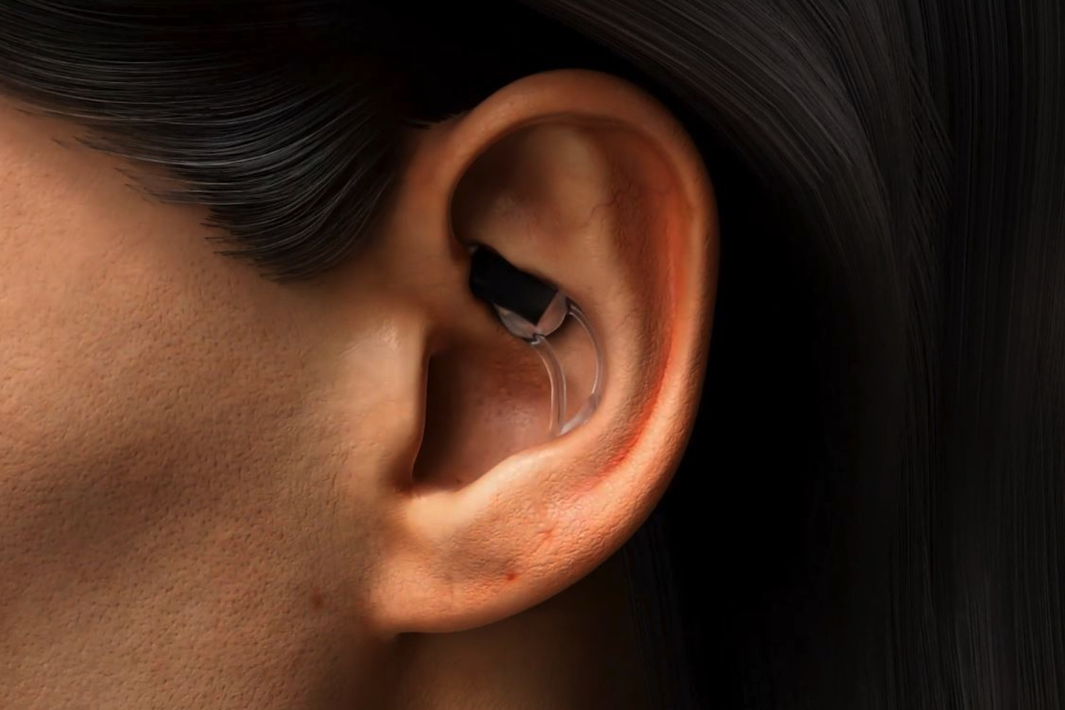 A person wearing the Stat Health Stat in-ear wearable.