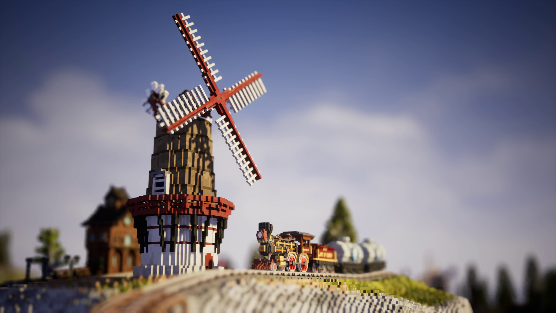 A train passes a windmill in Station to Station