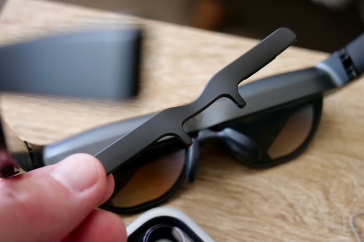 The TCL NXTWEAR S's magnetic lens accessory.