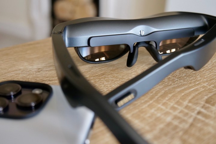 The back of the TCL NXTWEAR S, with the corrective lens accessory attached.