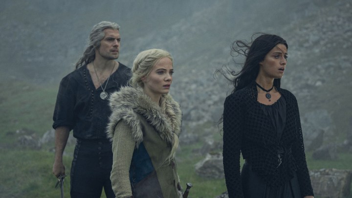Henry Cavill, Freya Allan, and Anya Chalotra as Geralt, Citi, and Yennefer in The Witcher.