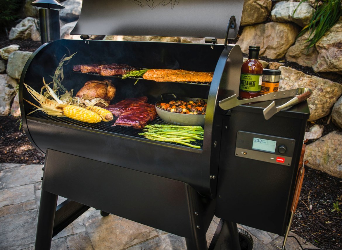 A full meal cooks on a Traeger Pro 780 grill.