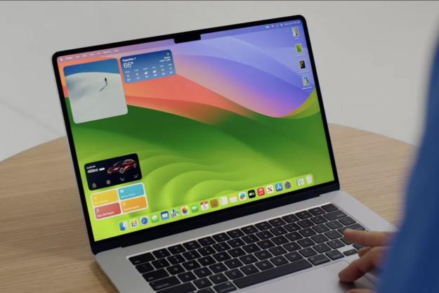 Apple's 15-inch MacBook Air on a desk, with macOS Sonoma running on its display.