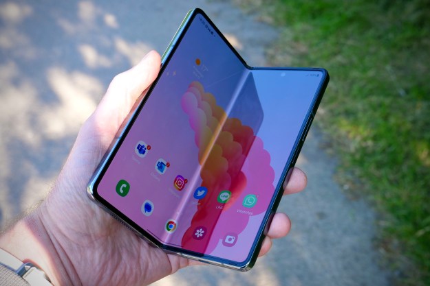 Breaking News A individual holding a partly originate Galaxy Z Fold 4.