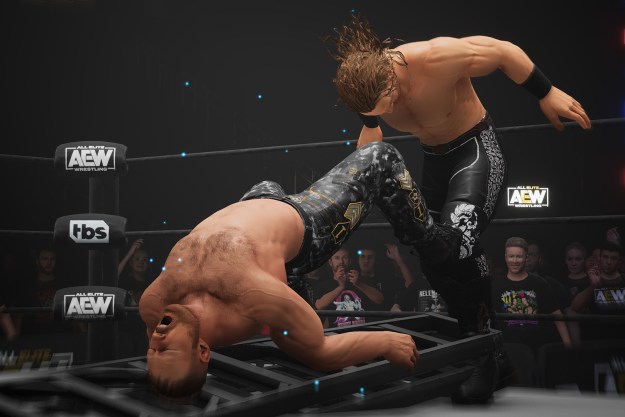 Hangman Adam Page throws Jon Moxley onto a ladder in AEW: Fight Forever.