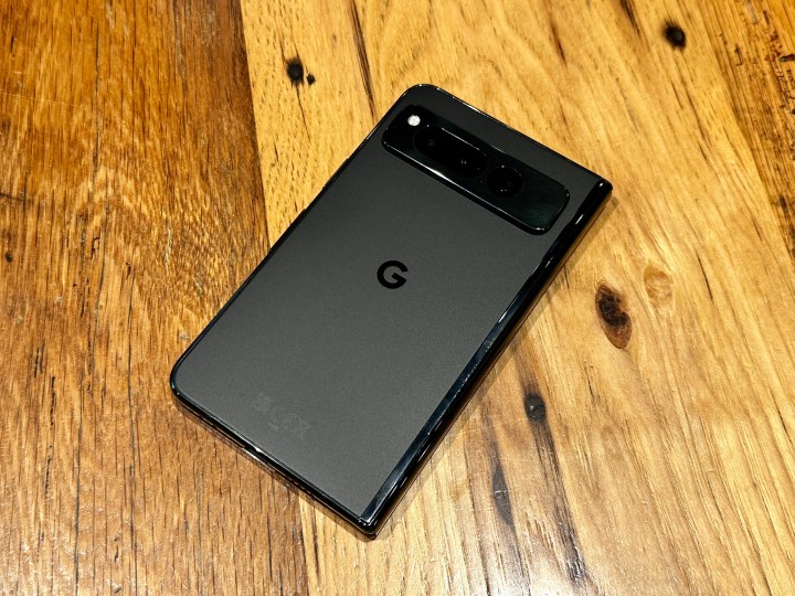 Google Pixel Fold in Obsidian on a wooden table.